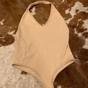 Open back tan bodysuit